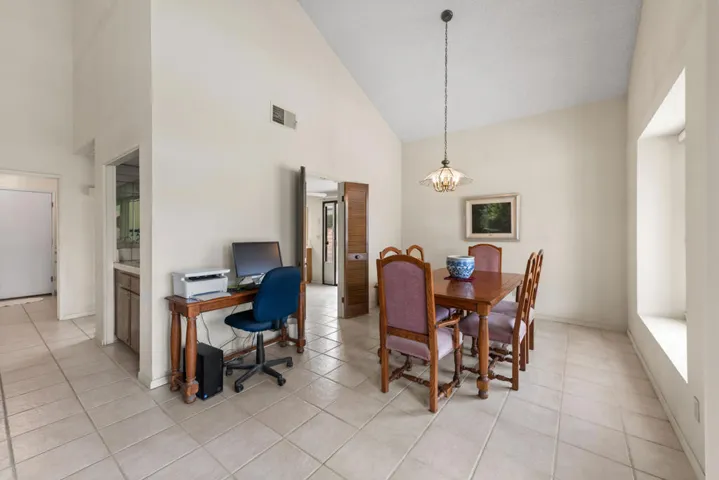 Dining Room With Vaulted Ceiling