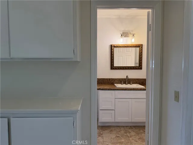 Bathroom 2 upstair w/built in cabinet at hall