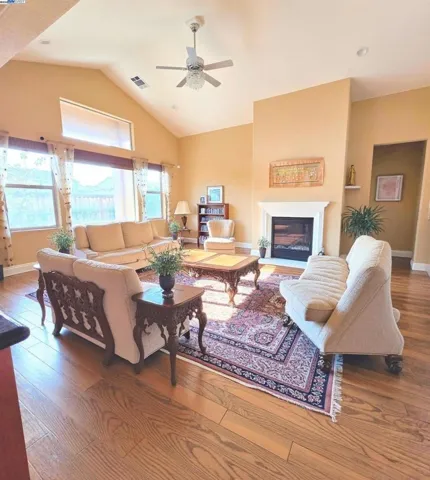 Living room is virtually staged.