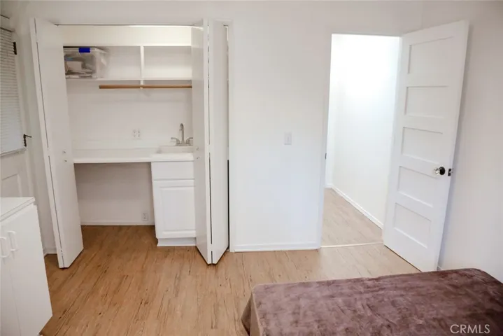 Room has its own sink and mini fridge. Ideal for guests or investment opportunity for renting