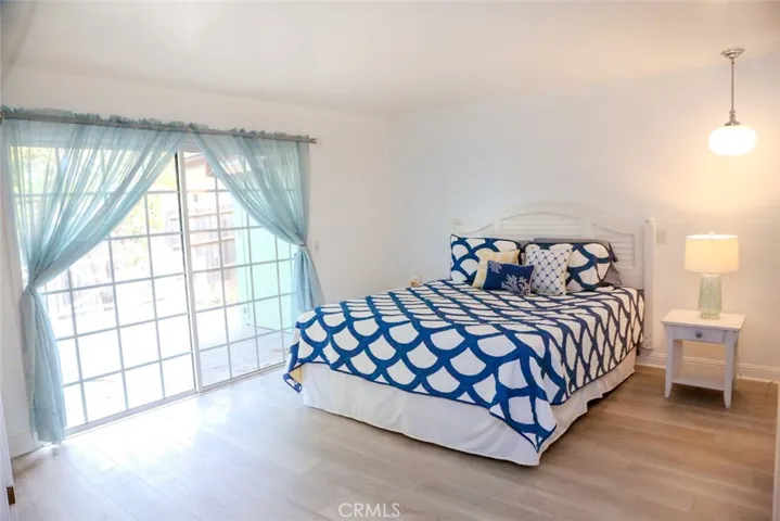 Primary Bedroom with slider to backyard deck