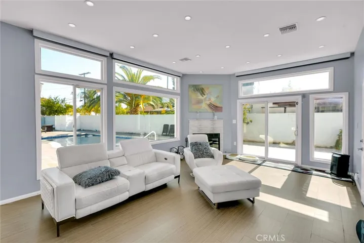 View of living area with great natural light from multiple windows