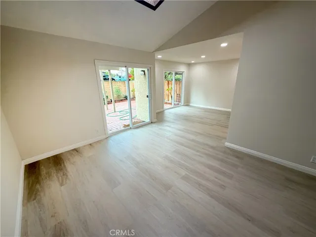 Living/Family Room View into Dining Room, Great Skylight Above
