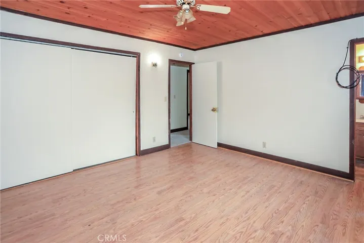 primary bedroom with full bath
