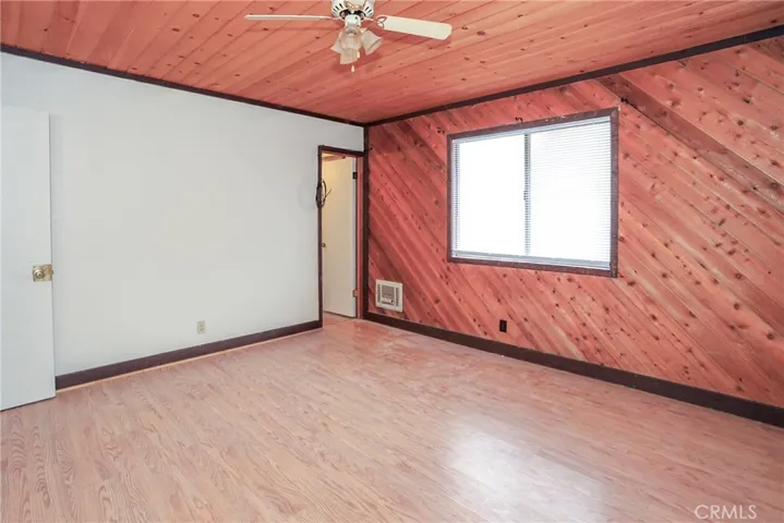 primary bedroom with full bath