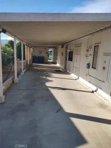 CARPORT PARKING UP TO THREE VEHICLES
