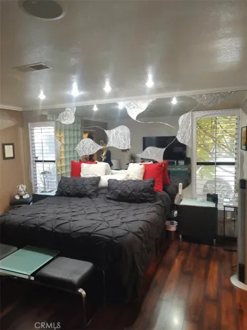 MASTER BEDROOM WITH ACCENT GLASS WALL