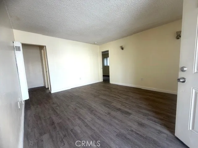 spacious living room with new flooring