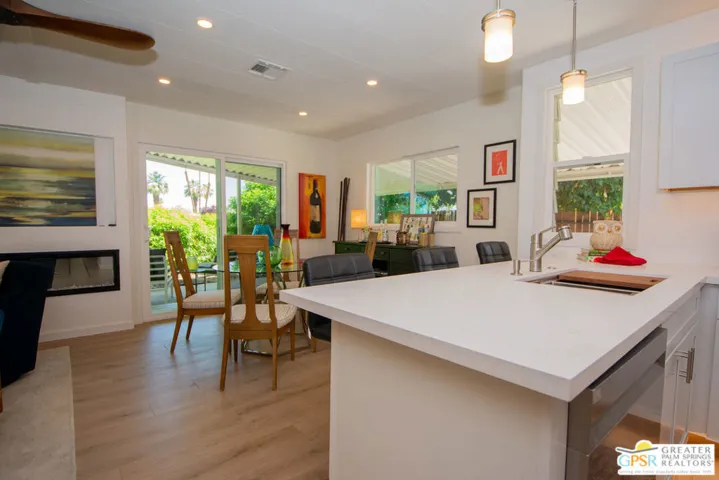 Kitchen Opens to Living and Di