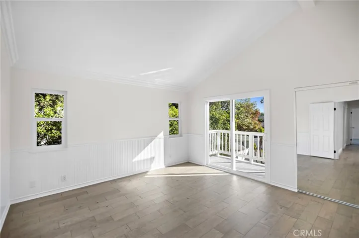 Primary Bedroom with Sliding Door to Private Balcony