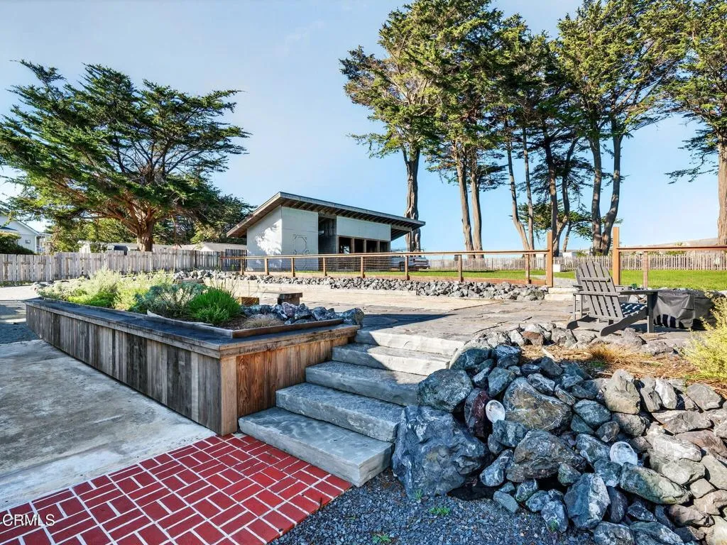 Stairs to the back yard and bocce court