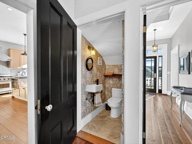 Powder room under the stairway