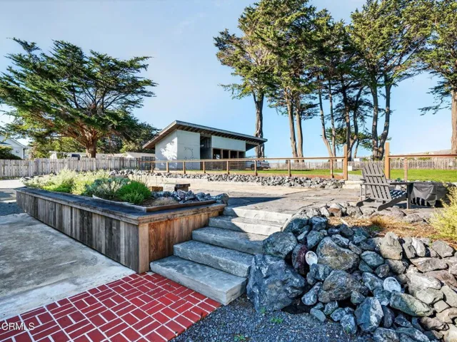 Stairs to the back yard and bocce court