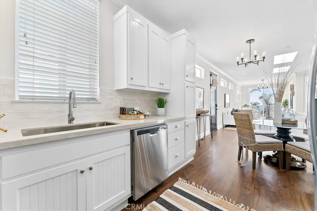 New Quartz Kitchen with Window over Farmhouse Sink