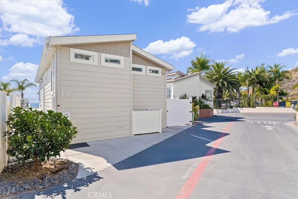 Greeted by blue ocean the moment you arrive at this luxury beach home in its well-maintained community.