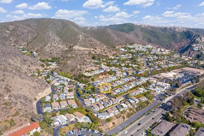 Located within Laguna Terrace - a community nestled in Coastal Foothills. Hiking & nature trails surround you.