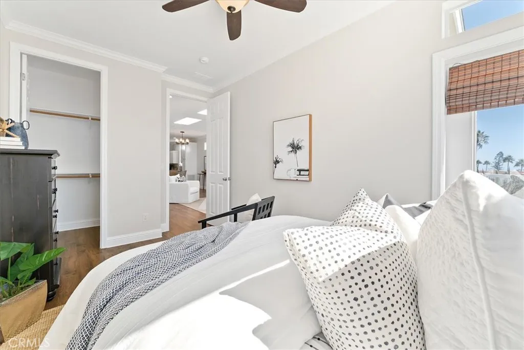 Bedroom I with Walk-in Closet & Lighted Ceiling Fan
