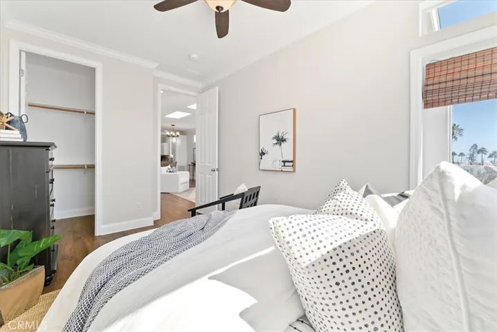 Bedroom I with Walk-in Closet & Lighted Ceiling Fan