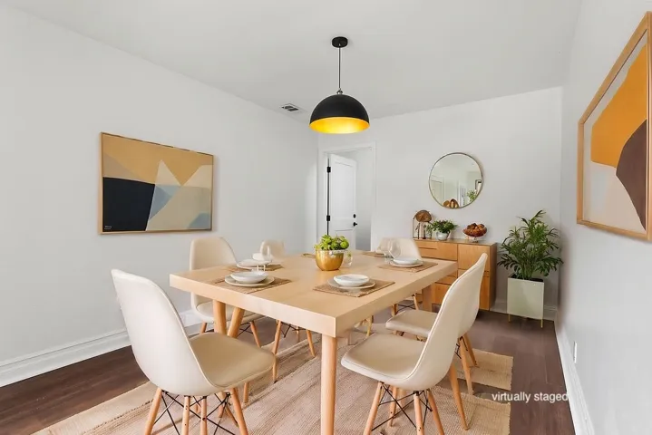 dedicated dining room adjacent to kitchen.  Virtually staged.  Unstaged photo below, or here:  https://bit.ly/940Dogwood