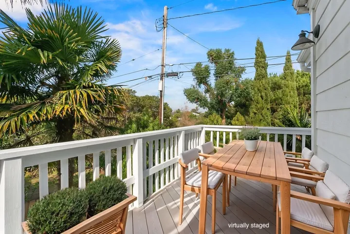 Deck off primary suite.  Virtually staged.  Unstaged photo below, or here:  https://bit.ly/940Dogwood