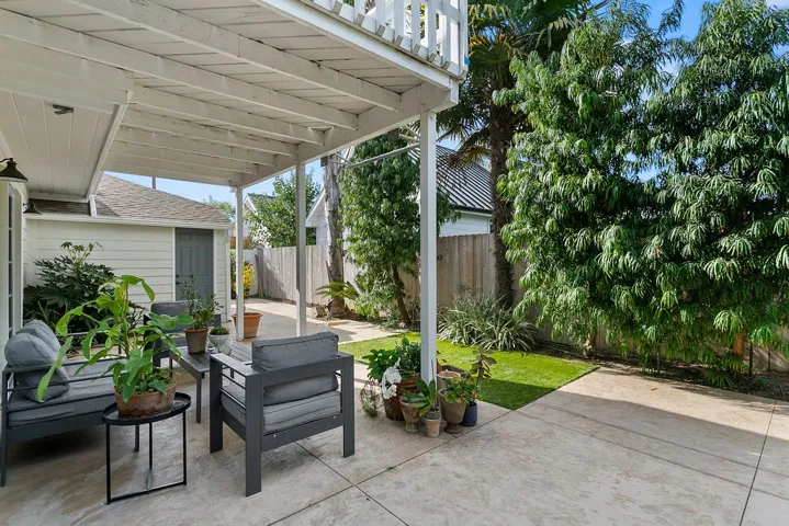 Private patio off kitchen.  Virtually staged.  Unstaged photo below, or here:  https://bit.ly/940Dogwood