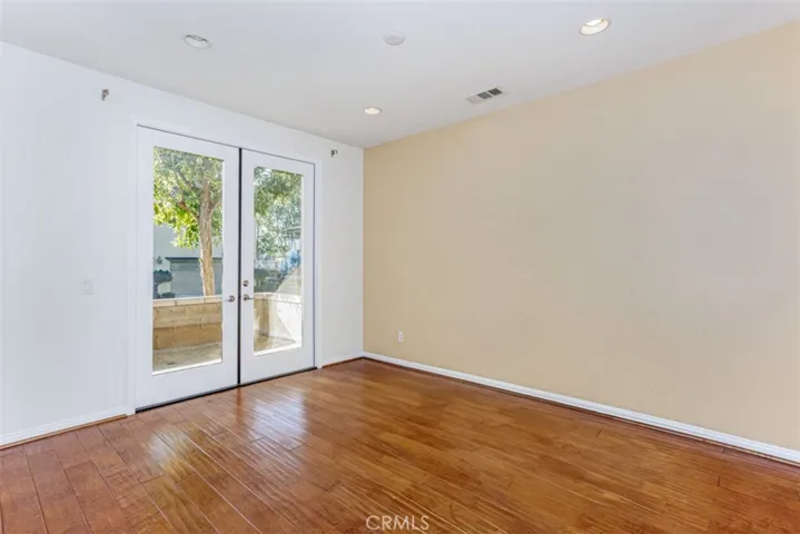 Formal dining room with French doors to patio.