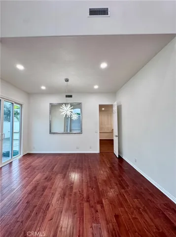 Formal dining room with door to family room