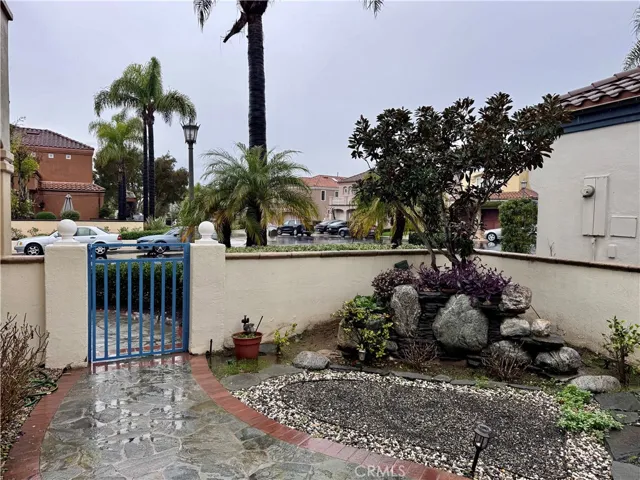 Gate to front door and side yard