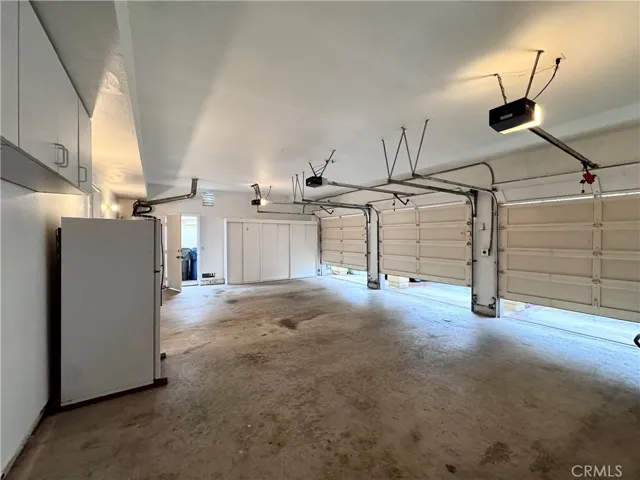 3-car garage with additional refrigerator