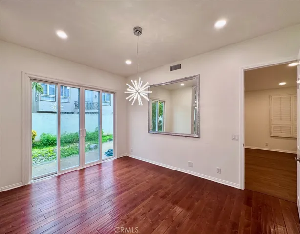 Formal dining room with sliding door to backyard