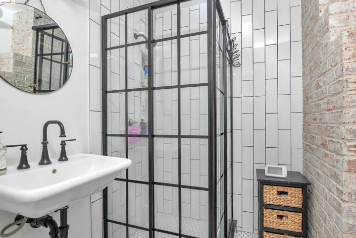 Bathroom featuring walk in shower
