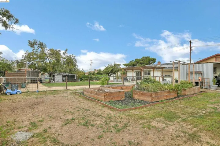 View of yard featuring a garden