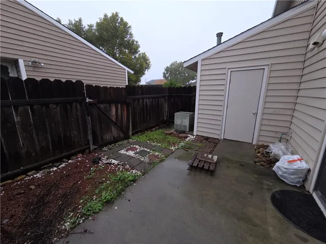 BACK YARD AND WATER HEATER CLOSET