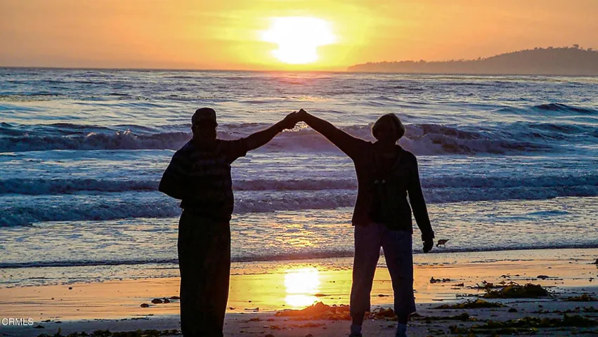 Sunset Holding Hands