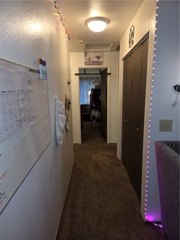 HALL WAY. LAUNDRY CLOSET ON RIGHT.