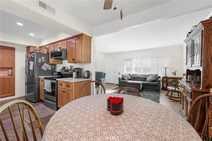 View of living room and kitchen from dining area