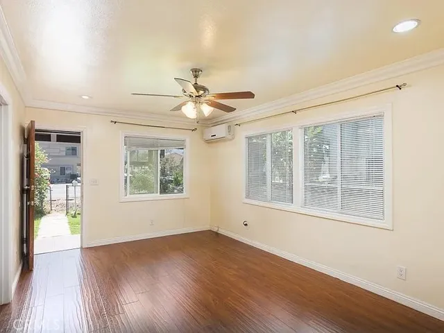 Living room with dual pane windows.