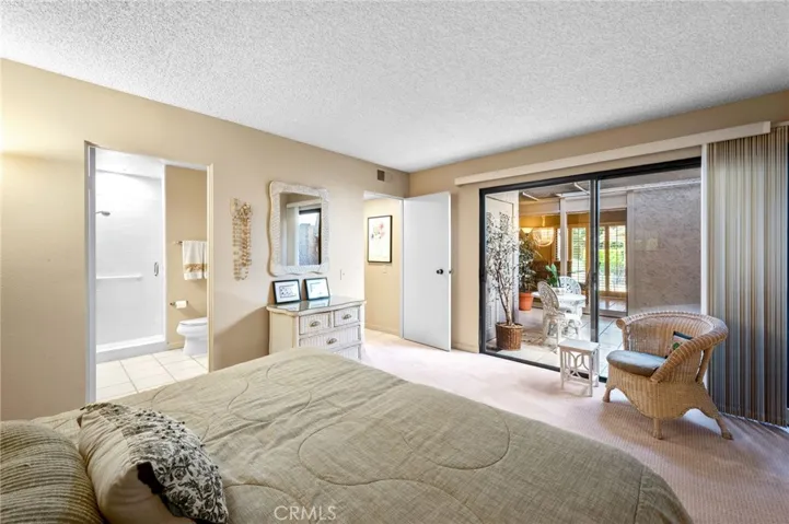 2nd Bedroom with sliding glass doors to Atrium