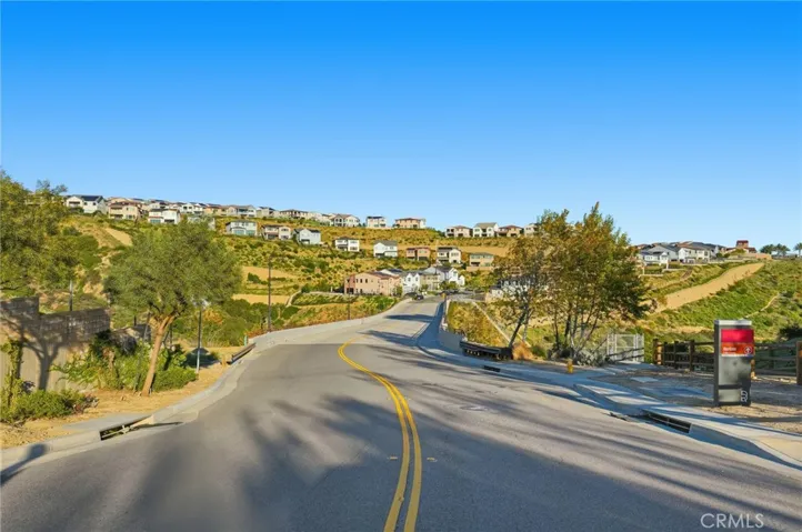 Head to the top of Topanga North of the 118 freeway. Turn right on Poema Place and drive into the newer Estate communmity of Deerlake Highlands. Turn left on Deerlake Ranch Rd and go up the hill. This nearly 40 acre parcel is on your left side directly behind the homes that are now under construction on your left side just before Horseshoe Trail.