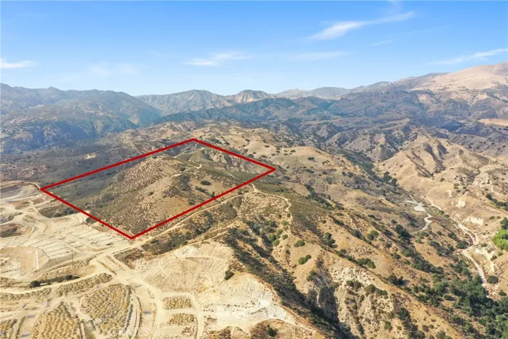 Photo from 2022 showing the area prior to the new construction of homes at Deer Lake being completed as well as rough approximate lot area.