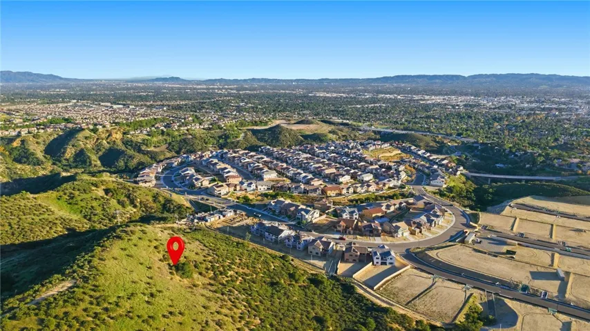 Drone view facing SE from the peak of the property