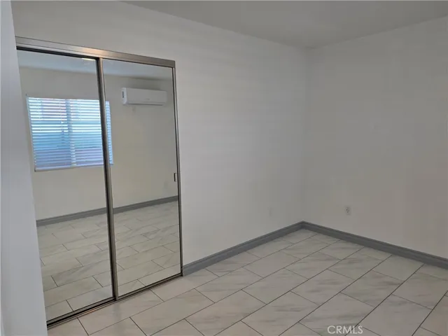 Mirrored Closet Space in Second Bedroom