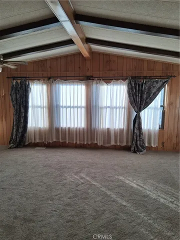 Huge living room with curtains included
