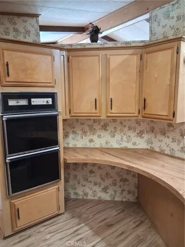Kitchen countertops and lots of cabinets