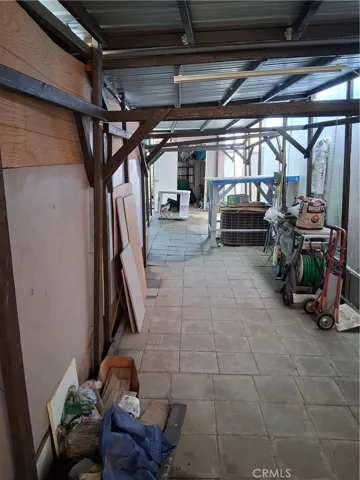 View from opposite end of rear covered patio area.