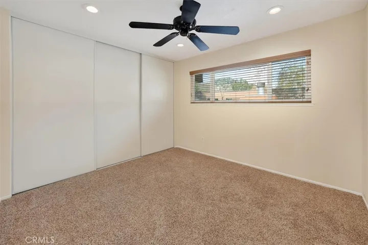 2 of 4 bedrooms. Spacious secondary bedroom with great natural light