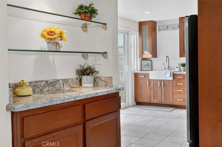 Ideal serving or display space connecting living and kitchen areas