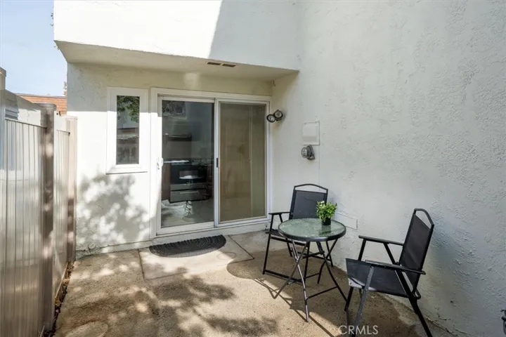 Low-maintenance space with room for plants or seating