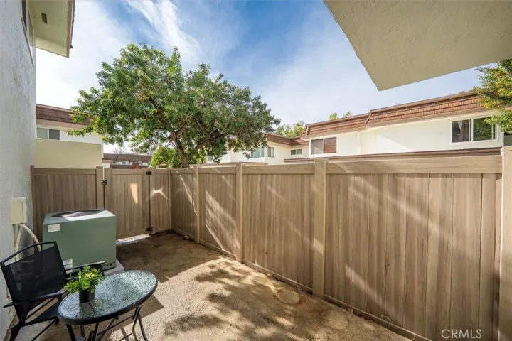 Quaint outdoor area off the kitchen for morning coffee or quiet retreat
