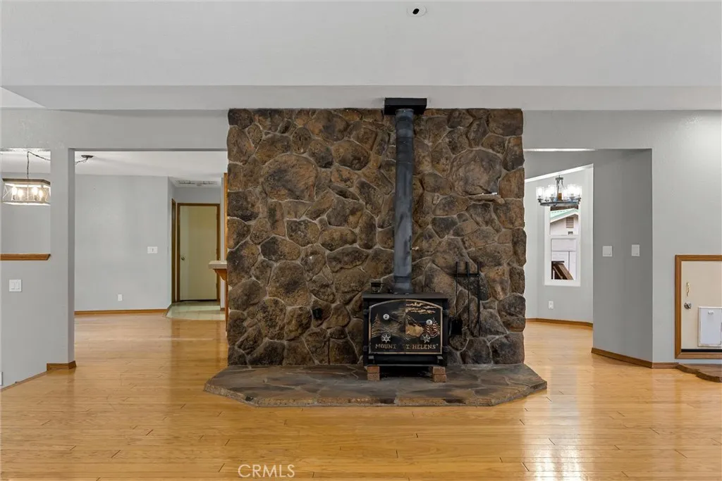 Wood burning fireplace heats very efficiently and adds warmth to the living space.